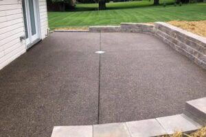 Patio concrete aggregate staying in process