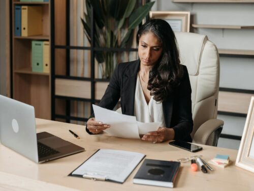 Woman Working at the Desk in Office