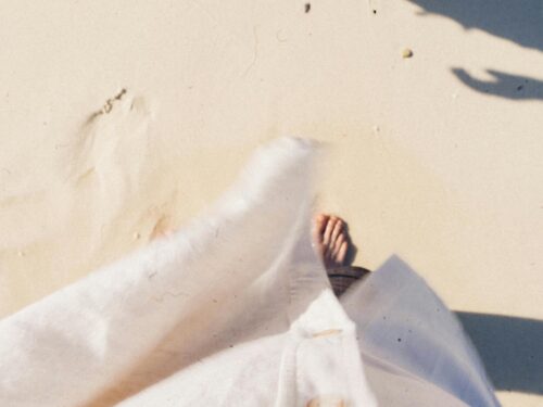 A peaceful barefoot stroll along the sandy beaches of Krabi, Thailand.